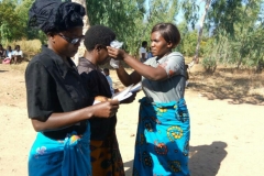 lions club help with glasses Mhuju Temwachi distributing reading glasses
